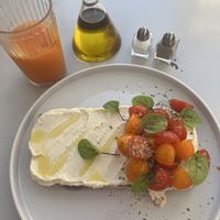 Vegan cashew nut cheese with cherry tomato - really light and savoury. I also had a carrot, orange and ginger juice which was good   at Manjerica in Lisbon