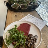 Toast with pink hummus and mushrooms  at Manjerica in Lisbon