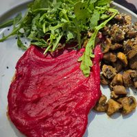 Sautéed mushrooms with beetroot on toast at Manjerica in Lisbon
