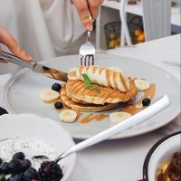 Try our exclusive pumpkin and oat pancakes, or the classics! at Manjerica in Lisbon
