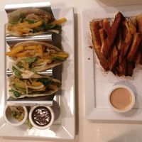 Yucas bravas and vegetable tacos at Lo De Monik in Havana