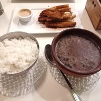 Beans and rice sides at Lo De Monik in Havana