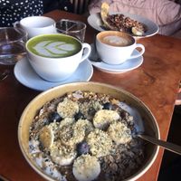 Vegan protein bowl and oat milk matcha latte  at Pom & Flora in Stockholm