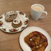 Almond croissant (with filling), pumpkin spice cookie, pizza pretzel & soy latte   at Bonus Bakery in Vancouver