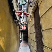 Entry alley at Hidden Gem Cafe in Hanoi