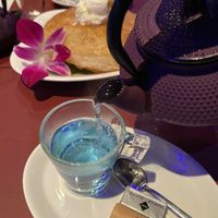 Blue tea and in the back a vegan dessert made from fried pancake and imported coconut icecream from Thailand. Note: eadible flower!  at Siri Thai in Mechelen