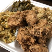 Platter with cauliflower steak, Mac and cheese, greens and dirty rice   at Soul Food Vegan in Houston