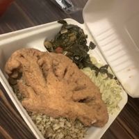 Cauliflower steak, collar greens, Mac & cheese, & seasoned rice. So good! You can substitute the cauliflower steak for oyster mushrooms or jackfruit ribs at Soul Food Vegan in Houston