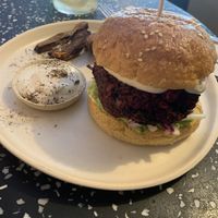 Hamburguesa vegana con batatas  at Nola Kitchen in Porto