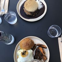 Blueberry pancakes and Eggs & Brioche  at Nola Kitchen in Porto