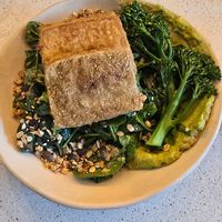 Green salad and also had the life is a beach drink. at Nola Kitchen in Porto