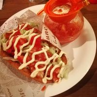 My fav Taco here out of self made Taco, soy meat, cheddar (opt.), tomatoes, salat, and sweet-sour sauce (many onions)-I put some mayoneese on top because they its 'japanese style'  at Osaka Tacos in Osaka