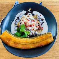 Sweet sticky rice with caramelized banana & coconut  at Nahm  in Nelson
