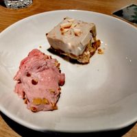 Coconut banana pie and plum dessert with red wine at Tibits in Darmstadt