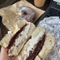 Beet lox dill cream cheese bagel with a lemon poppyseed donut   at Familiars in Brooklyn