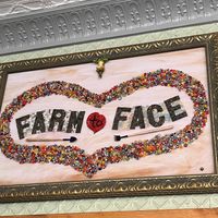 Love the art & the name! If you look close or zoom in, there’s a very cute, upside down, meditating frog 🐸 upside down at the top   at Farm to Face Cafe in Baltimore