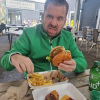 My non vegan boyfriend tucking into the BBQ burger. He scoffed the lot. I think that says it all 😊 at Dirty Kitch in Coventry