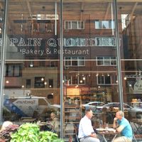 Front entrance (you can see the front of the famous "Soup Nazi" --i.e., Soup Kitchen-- reflected in the window).
 at Le Pain Quotidien - 55th St in New York City