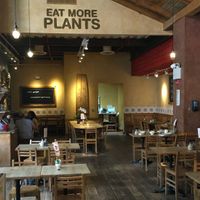 Inside seating--eat more plants! at Le Pain Quotidien - 55th St in New York City