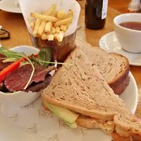 Avocado, humous, salad sandwich with chips and vanilla tea at The Tithe Barn in Cosby