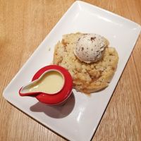 Apple crumble with custard and choc chip ice cream at Frankie & Benny's - Meadowhall in Sheffield