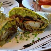 Vegan Burrito w guac, hash browns and mushrooms   at Cafe Home in Blenheim
