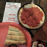 Vegan Chicago stlye deep dish Pizza and garlic breadstix. at Cappy's Pizzeria in Riverview