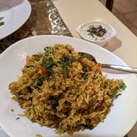 Veg biryani with vegan yogurt sauce. at Shree Ram in Lisbon