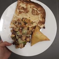 Some naan, vegan samosa and idk the name of the bean and potato dish at Shree Ram in Lisbon