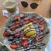 Buckwheat crepe with mango ice cream, strawberries and chocolate spread   at Ice Crepe in Batalha