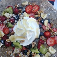 Vegan buckwheat crepe with fruits, nuts, maple syrup and whipped cream at Ice Crepe in Batalha