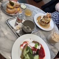 Tosti ham&cheese (not vegan), fluffy pancake (not vegan) and the vegan French toast in front   at Tinsel in Antwerpen