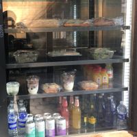 Fridge with grab & go items. When I visited today, the only vegan items was the fruit bowl.  at Le Pain Quotidien - Verdi Square Kiosk in New York City