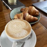 A cappuccino with some vegan croissants  at Vegabond - West in Amsterdam