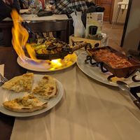 Vegan tofu garlic bread, flaming vegetable sach and traditional Bulgarian bochurmoz at 4Directions in Bansko