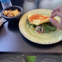 Vegetarian omelet with a side of sautéed potatoes    at Green Bites in Dorado