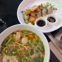Tom Yum Noodle Soup & Kimchi Dumplings  at Veganerie - Silom in Bangkok