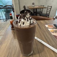 ‘Dark Chocolate Smoothie’ - tastes like ice cubes blended with cocoa - 175 THB !? Far more delicious (and infinitely better value) are the chocolate soy Vitamilk from 7-Eleven  at Veganerie - Silom in Bangkok