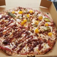Half Georgia Peach, half Hawaiian. All gluten-free and vegan. Melty cheese! at Plant Based Pizzeria in Atlanta