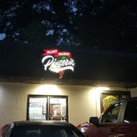Sign over door at Plant Based Pizzeria in Atlanta