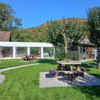 Outside seating in pretty garden with lovely views at Kitnors in Minehead