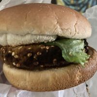 Kale Quinoa Burger with lettuce and ketchup  at The Green Vegan Monsta in Brooklyn