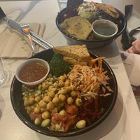 Asian Bowl with rice and tempeh (front) Aztec bowl with rice and tempeh (back) at Copper Branch in Nice