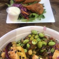 Asian fusion bowl and soy buffalo wings at Copper Branch in Nice