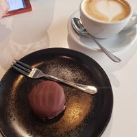Bounty candy and cappuccino ❤️ at BioBio in Riga