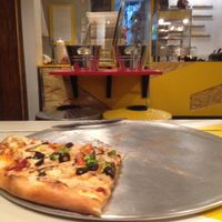 Vegan pizza with pinapples at Attaboy Pizza in Quebec