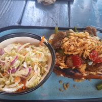 Brat on pretzel bread with extra slaw at 4th Street Fillin Station in Cocoa Beach