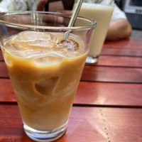 Iced latte with oat milk   at Coffee Station in Phong Nha