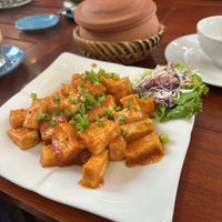 Tofu with tomato sauce and rice   at Coffee Station in Phong Nha
