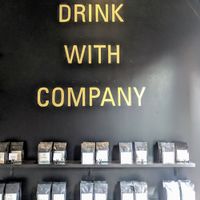 Drinking with company at WithCo Coffee in San Luis Obispo